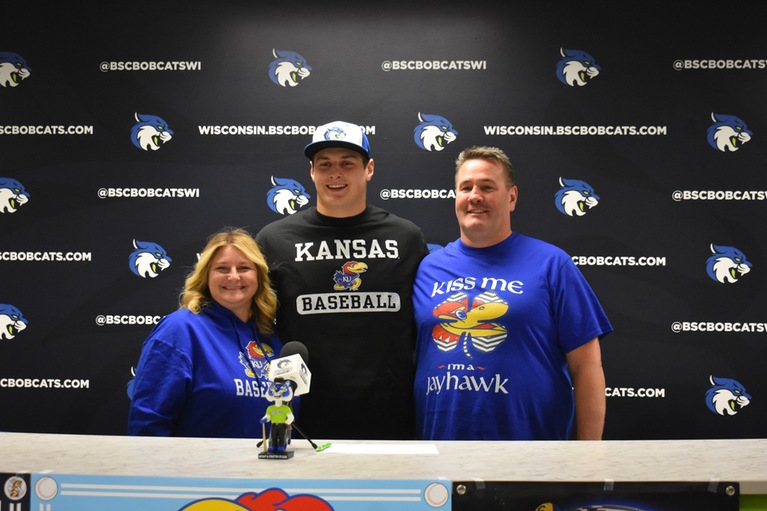 Alex Breckheimer (middle) with his parents