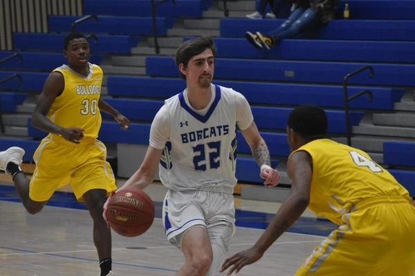 Bryant & Stratton College defends home court in win over Richard Daley